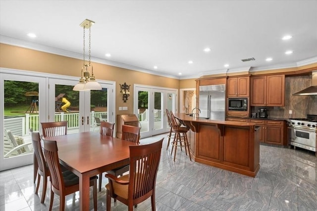 54 Wagon Rd, Walpole, MA 02081 - dining space featuring french doors, recessed lighting, ornamental molding, and light marble finish floors