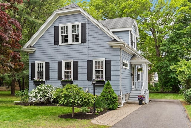 35 Orchard Rd, Milton, MA 02186 - view of front of house featuring a front yard