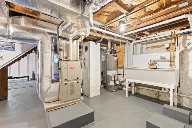 35 Orchard Rd, Milton, MA 02186 - unfinished basement featuring gas water heater and heating unit