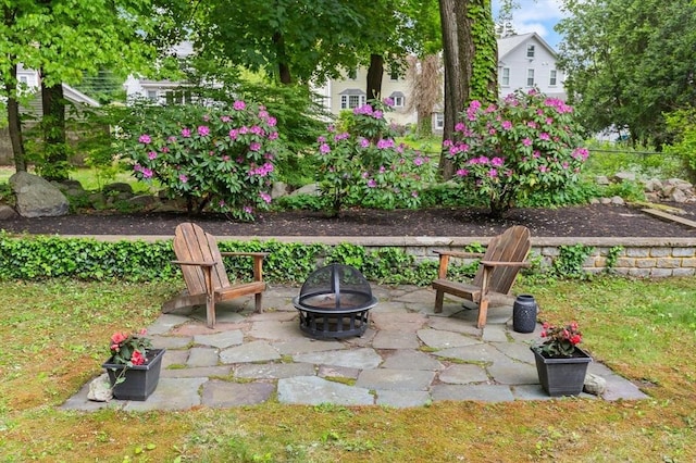 35 Orchard Rd, Milton, MA 02186 - view of patio / terrace with a fire pit