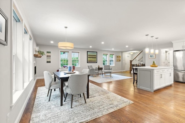 35 Orchard Rd, Milton, MA 02186 - dining area with stairway, recessed lighting, light wood-type flooring, and baseboards