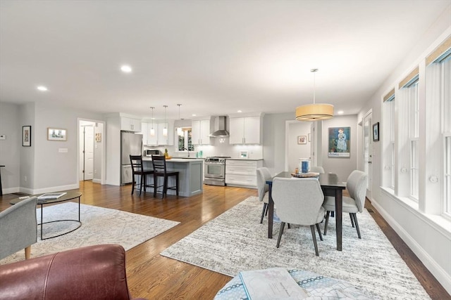 35 Orchard Rd, Milton, MA 02186 - dining space with wood finished floors, recessed lighting, and baseboards