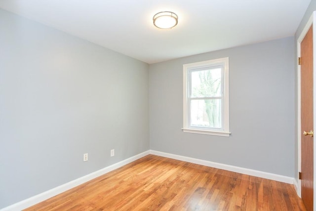 80 Dobbins St, Waltham, MA 02451 - unfurnished room featuring baseboards and light wood-style flooring