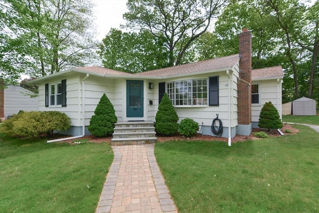 80 Dobbins St, Waltham, MA 02451 - ranch-style home with a chimney, a front lawn, and a shingled roof