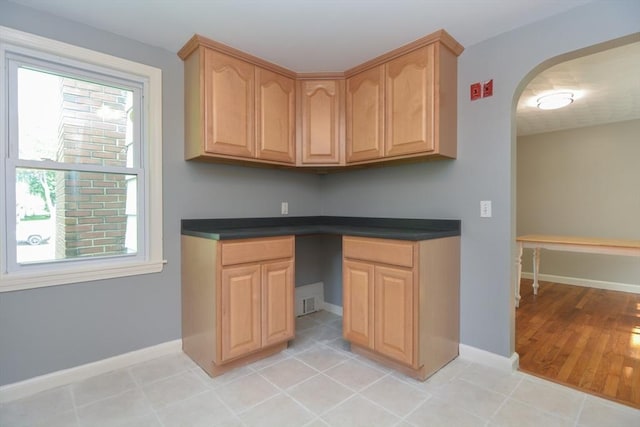 80 Dobbins St, Waltham, MA 02451 - unfurnished office featuring healthy amount of natural light, baseboards, and arched walkways