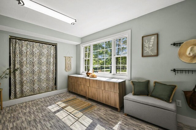 11 Fern Ave, Amesbury, MA 01913 - full bathroom with baseboards, a shower with curtain, and wood finished floors