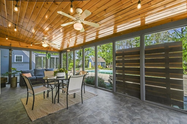 11 Fern Ave, Amesbury, MA 01913 - sunroom / solarium with ceiling fan, wooden ceiling, stone flooring, and an outdoor hangout area
