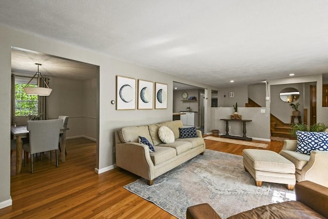 11 Fern Ave, Amesbury, MA 01913 - living area featuring stairway, wood finished floors, recessed lighting, and baseboards