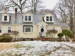 view of new england style home