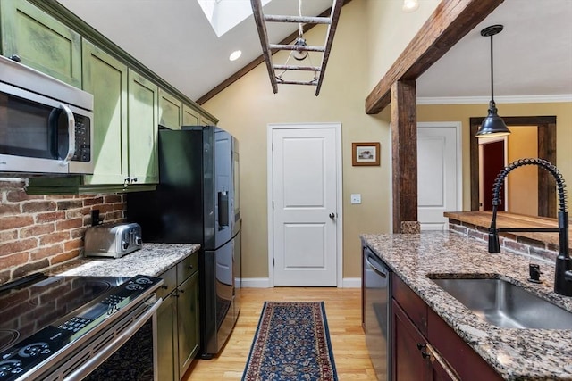 6 Rebanna Rd, Westminster, MA 01473 - kitchen featuring green cabinetry, stainless steel appliances, a skylight, ornamental molding, and light wood-type flooring