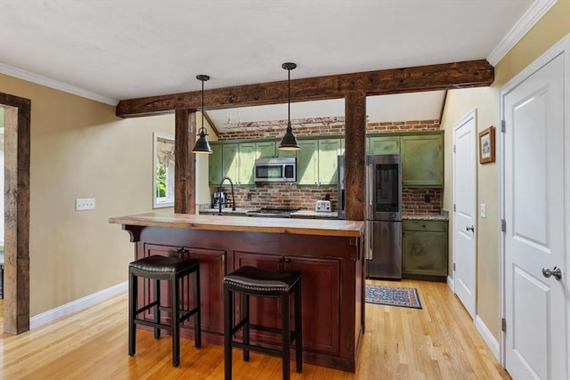 6 Rebanna Rd, Westminster, MA 01473 - kitchen featuring stainless steel appliances, green cabinets, healthy amount of natural light, light wood-type flooring, and beam ceiling