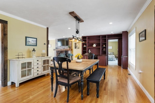 6 Rebanna Rd, Westminster, MA 01473 - dining space with a brick fireplace, ornamental molding, light wood-style floors, and recessed lighting