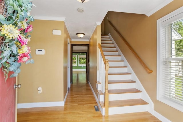6 Rebanna Rd, Westminster, MA 01473 - staircase featuring healthy amount of natural light, wood finished floors, and ornamental molding