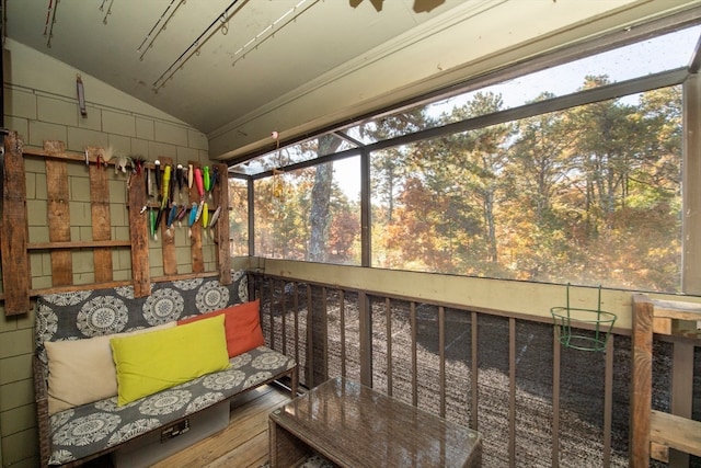 sunroom with vaulted ceiling and plenty of natural light