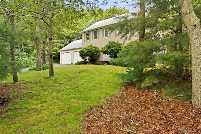 view of yard with a garage