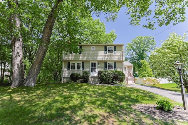 14 Shady Oak Ln, Natick, MA 01760 - colonial house with a front lawn and driveway