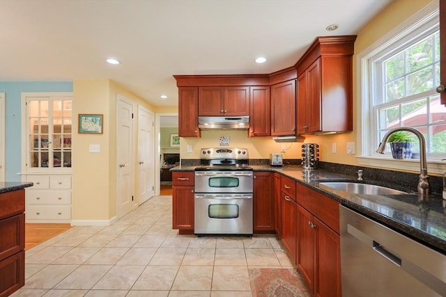 14 Shady Oak Ln, Natick, MA 01760 - kitchen with appliances with stainless steel finishes, under cabinet range hood, a sink, dark stone counters, and recessed lighting