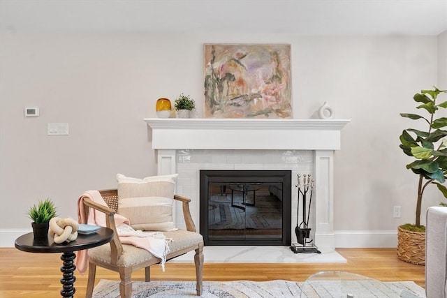 2028 Main St, Concord, MA 01742 - detailed view of wood finished floors and a fireplace