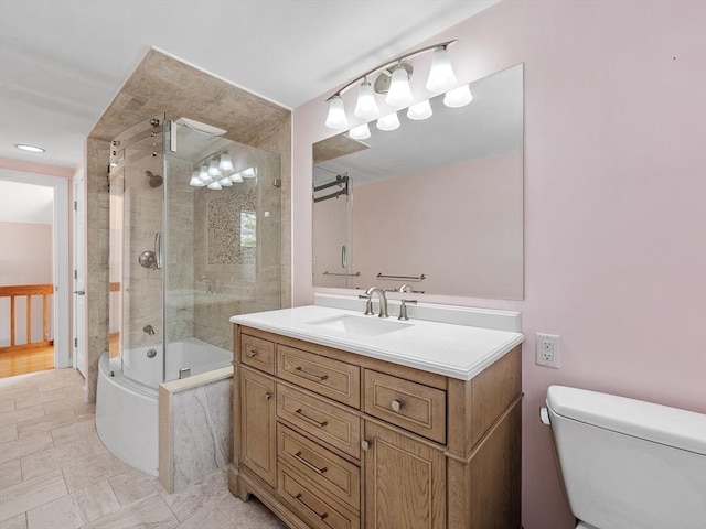 full bathroom with toilet, bath / shower combo with glass door, and vanity