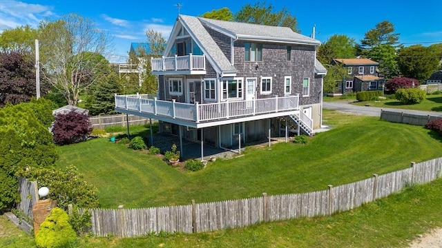 5 Bayview Ave, Fairhaven, MA 02719 - rear view of house with a balcony, a wooden deck, a shingled roof, and stairs