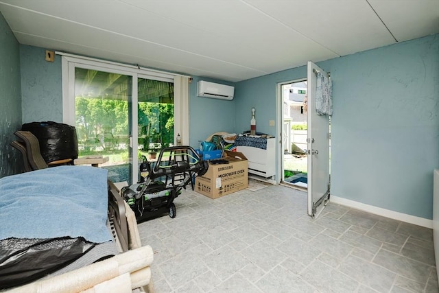 5 Bayview Ave, Fairhaven, MA 02719 - living room with a wall mounted AC, light stone finish floors, and baseboards