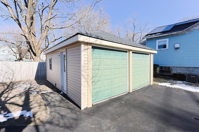 garage featuring central air condition unit