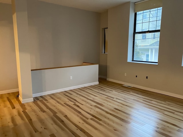 empty room featuring light hardwood / wood-style floors