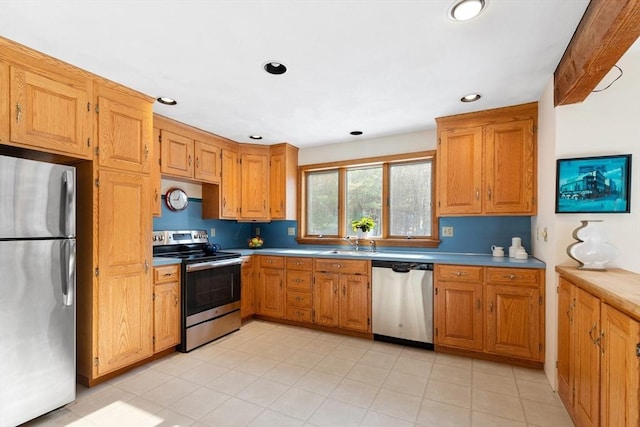 kitchen featuring stainless steel appliances and sink