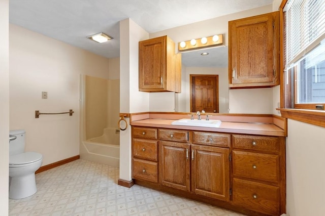 full bathroom featuring vanity, toilet, and tub / shower combination