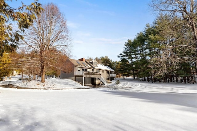 view of front of home with a deck