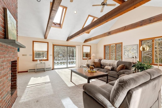 carpeted living room featuring beamed ceiling, a baseboard radiator, a skylight, and high vaulted ceiling