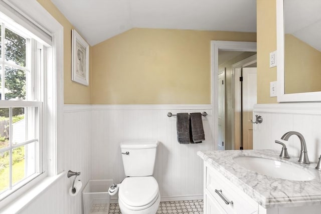 15 Maple St, Salem, MA 01970 - bathroom with lofted ceiling, wainscoting, plenty of natural light, and vanity