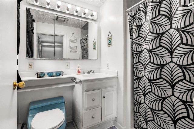 bathroom with toilet, a textured ceiling, vanity, and a shower with shower curtain