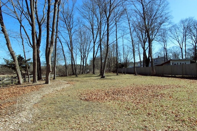 view of yard featuring fence