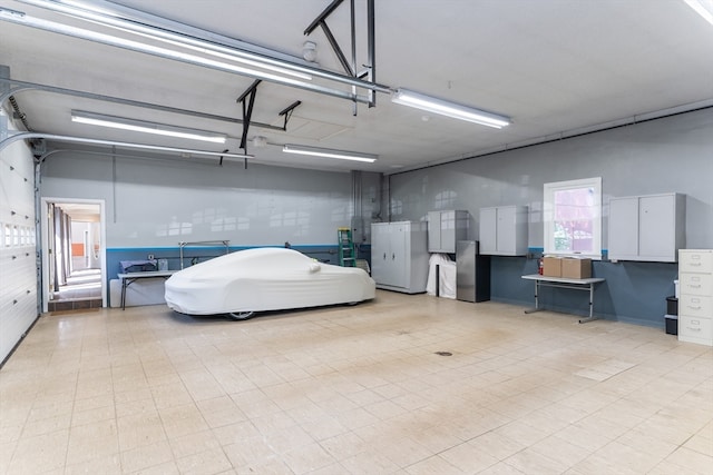 garage with white refrigerator