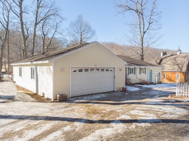 exterior space with a garage