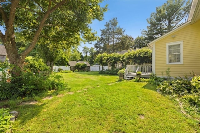 view of yard featuring a deck