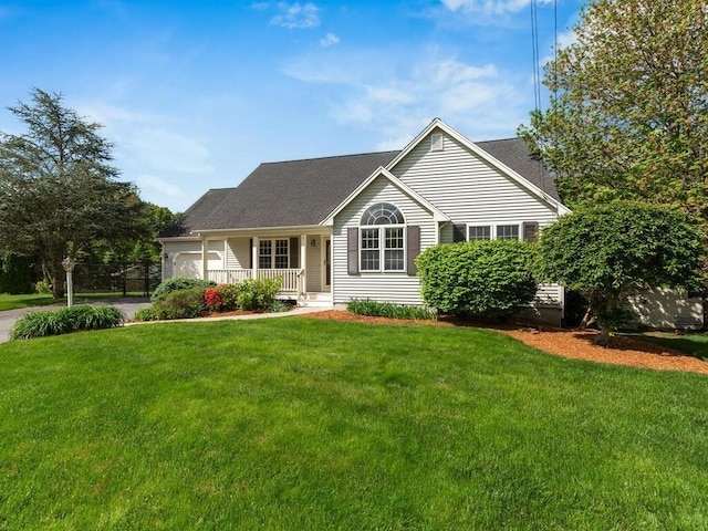 51 Old Stagecoach Rd, Attleboro, MA 02703 - view of front of home with a porch, a front lawn, an attached garage, and driveway