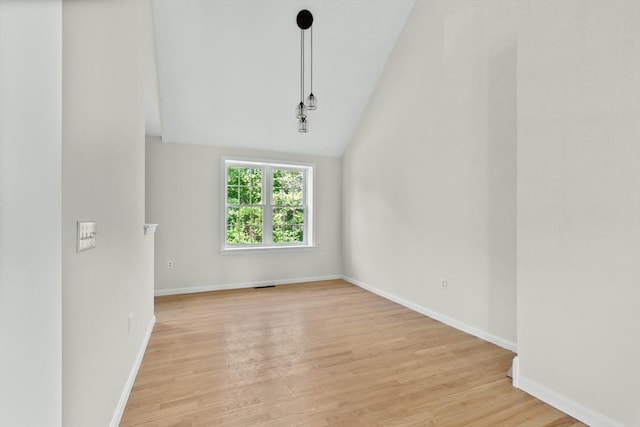 51 Old Stagecoach Rd, Attleboro, MA 02703 - empty room with lofted ceiling, light wood-type flooring, and baseboards