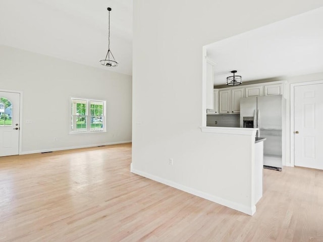 51 Old Stagecoach Rd, Attleboro, MA 02703 - unfurnished living room featuring light wood-style flooring and baseboards