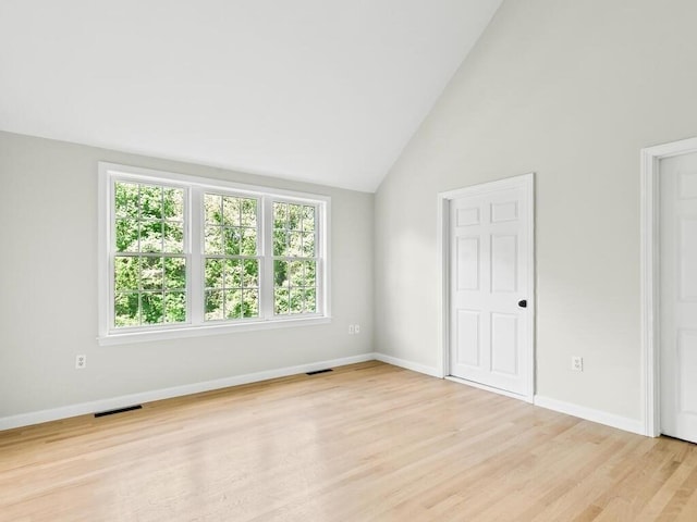 51 Old Stagecoach Rd, Attleboro, MA 02703 - unfurnished bedroom with light wood-style floors, baseboards, and high vaulted ceiling