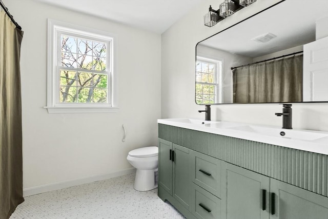 51 Old Stagecoach Rd, Attleboro, MA 02703 - full bathroom with baseboards, toilet, and double vanity