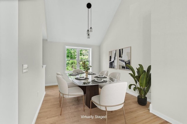 51 Old Stagecoach Rd, Attleboro, MA 02703 - dining area featuring baseboards, wood finished floors, and high vaulted ceiling