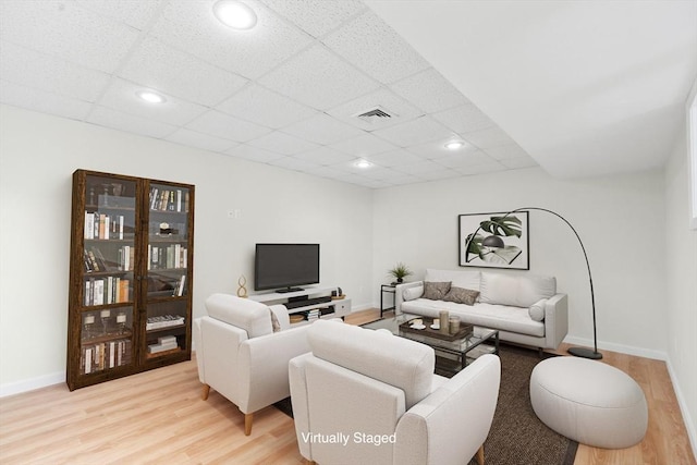 51 Old Stagecoach Rd, Attleboro, MA 02703 - living room featuring light wood-type flooring, a drop ceiling, baseboards, and recessed lighting