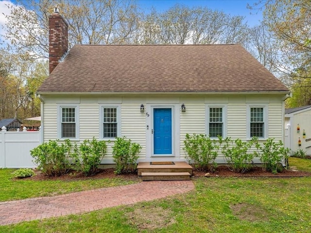 59 Brigantine Cir, Plymouth, MA 02360 - new england style home with a chimney and roof with shingles