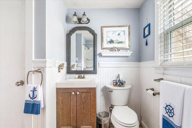 59 Brigantine Cir, Plymouth, MA 02360 - full bathroom with a wainscoted wall, toilet, and vanity