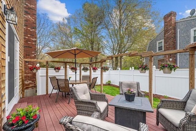 59 Brigantine Cir, Plymouth, MA 02360 - deck with a fenced backyard, outdoor dining area, and outdoor lounge area
