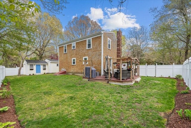 59 Brigantine Cir, Plymouth, MA 02360 - back of house featuring a deck, a chimney, a gazebo, and central AC unit