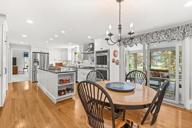 80 Christian Way, North Andover, MA 01845 - dining room featuring plenty of natural light, recessed lighting, a chandelier, and light wood-type flooring
