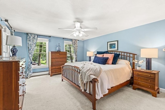 80 Christian Way, North Andover, MA 01845 - bedroom featuring light colored carpet, a baseboard heating unit, and a ceiling fan